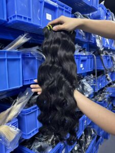 Wholesale Indian wave bundles for salons natural light showing loose wavy texture