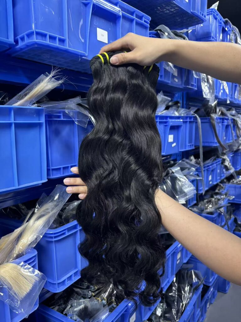 Wholesale Indian wave bundles for salons natural light showing loose wavy texture